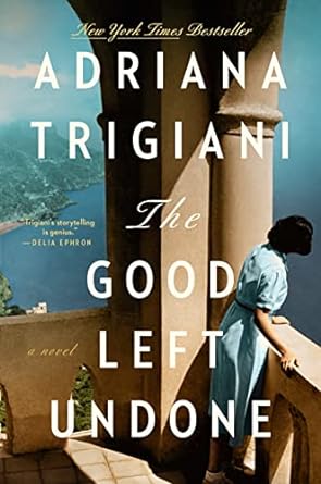 woman in Italy leaning over balcony